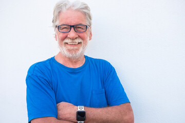 Portrait close-up of a smiling senior man with white beard on white background wearing eyeglasses...