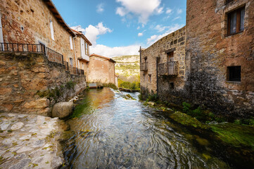 Fototapeta na wymiar Picturesque Village Orbaneja Del Castillo in Burgos, Castilla Leon, Spain. High quality photo
