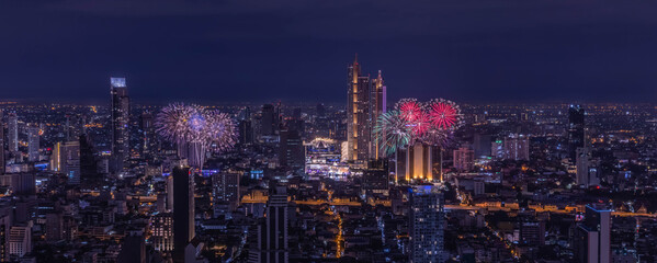 Panorama view of Beautiful fireworks over city of Bangkok, Thailand