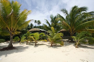 Fototapeta na wymiar Aretai Beach Villas accommodation on Aitutaki Island. Cook Islands.