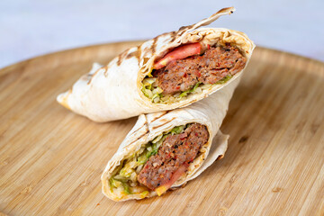 Turkish and Arabian Traditional Adana and Urfa kebab, minced meat kebab. Turkish food culture with...