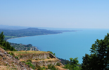 Fototapeta na wymiar Abkhazia. The view from Anakopia fortress in the city of New Afon. Medieval fortress