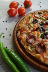 Mixed pizza on stone background