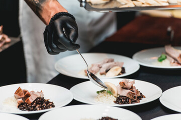 Cuban style beef picadillo served with white rice and black beans.