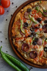Mixed pizza on stone background