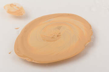 Texture of liquid foundation Background made of liquid foundation Make-up concept. Skin Tone Cream