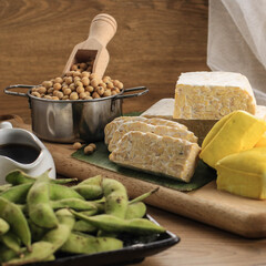 Soy Product: Raw Tofu, Tempeh, Soy Milk, Soy Sauce, and Soy Bean. Concept of Healthy Vegetarian Food