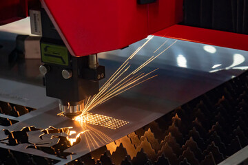 The fiber laser cutting machine cutting  machine cut the metal plate. The hi-technology sheet metal...