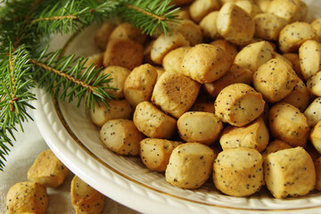 Christmas Eve cookies Kuciukai (or Slizikai). Kuciukai are served during Christmas Eve dinner in...