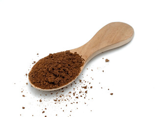 Instant coffee powder with wooden spoon isolated on white background