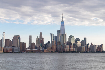 Fototapeta na wymiar Lower Manhattan Skyline along the Hudson River in New York City with Beautiful Clouds
