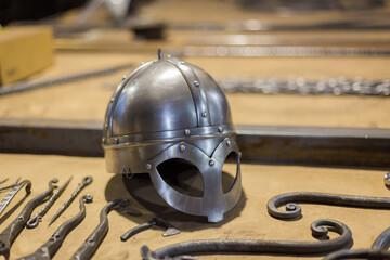 Blacksmith decorative elements at forge, workshop. Handmade, craftsmanship and blacksmithing concept