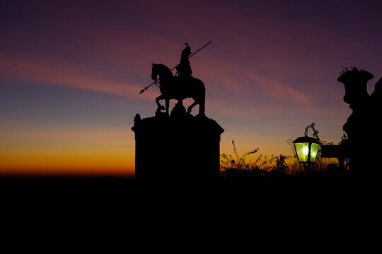 The public monument of "Sao Longuinho", famous statue silhouette at sunset in Bom Jesus do Monte, Braga, Minho, Portugal.