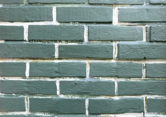 Green textured brick wall background