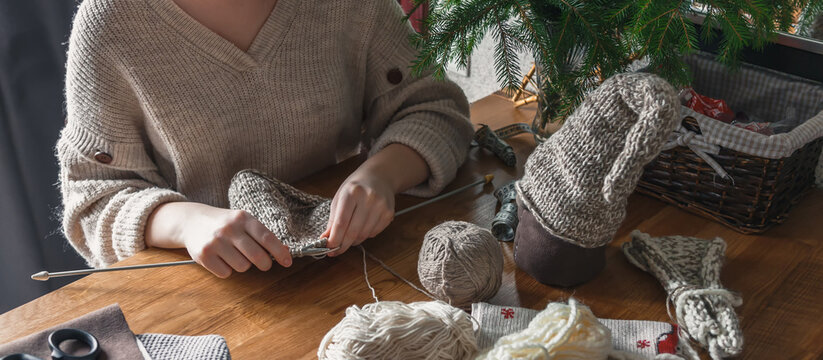 DIY christmas.Handmade a Christmas gnome at home, from recycled materials, zero waste. Creativity at home in lockdown covid19. Christmas gifts, congratulations..