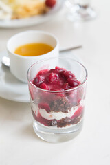 Glass of granola with berries