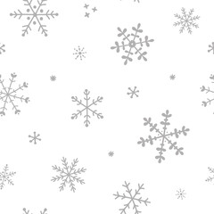 Hand drawn winter seamless patterns. Snowflakes, Christmas, New Year backdrop. Decorative background for fabric, textile, wrapping paper, card, invitation, wallpaper, web design
