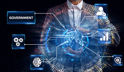 The concept of business, technology, the Internet and the network. A young entrepreneur working on a virtual screen of the future and sees the inscription: Government