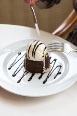 Ice cream and brownie served on a plate