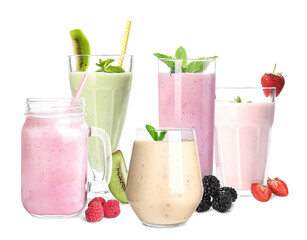 Different tasty milk shakes on white background