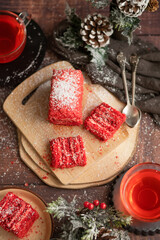Strawberry piece of cake and red fruit tea, with winter decorations