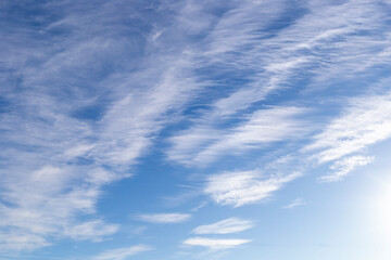 Clear blue sky with beautiful natural light white clouds
