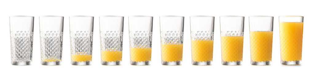 Glasses with different amount of orange juice on white background