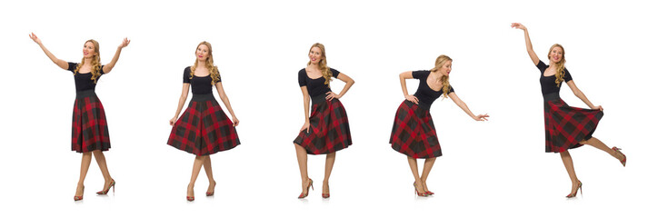 Beautiful young woman in plaid dress isolated on white