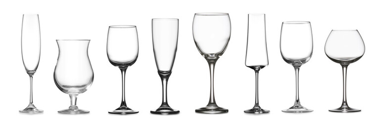 Different empty glasses on white background