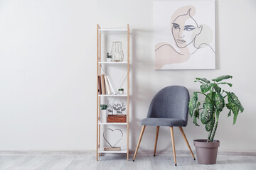Interior of modern stylish room with chair and shelf unit