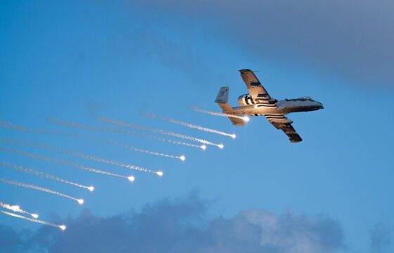 Military bomber dropping flares at the Fort Lauderdale Air and Sea Show