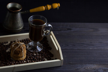 Turk and coffee in a clear glass on the table