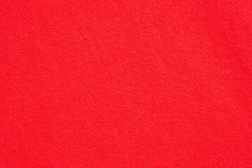 Red fabric cloth texture background close up