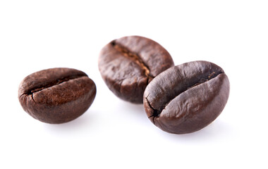 Coffee beans on white background closeup.