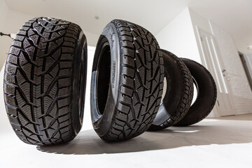 Four tires on the white background
