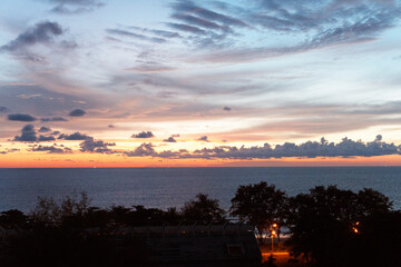 Obraz premium Landscape of the evening dawn blue sky with clouds over the ocean by the sunset on the abstract clouds pattern background, refer to the hope and freedom of the future