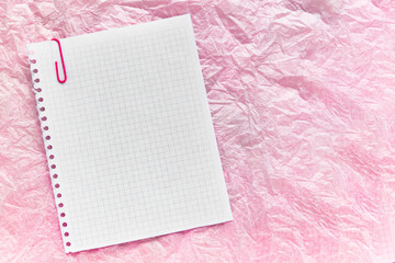 Open blank notepad on pink backgrounds. Template with copy space for your text