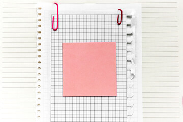 Pink sticker on the paper sheets. Template with copy space for your text