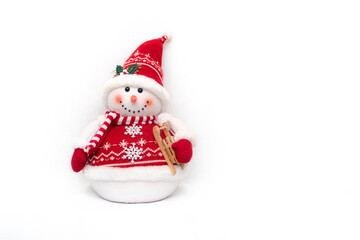 smiling toy snowman on white background. Place for text