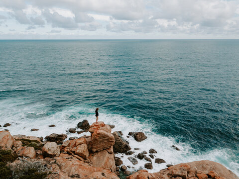 Aerial shot of man at the ocean