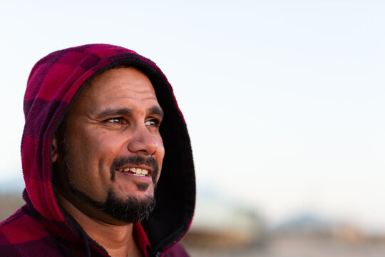 Smiling man wearing hoody head and shoulders