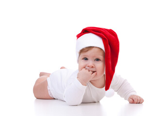 Happy santa baby with white blank board isolated on white background. Small model in santa hat at studio. Christmas, xmas, winter concept. Santa boy looking at camera - 394735195