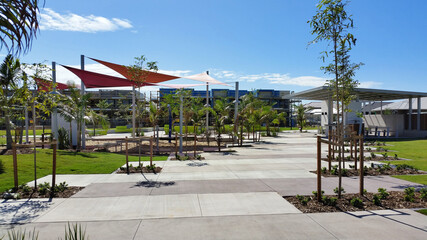 Children's play park and exercise park in suburban area with shade sails
