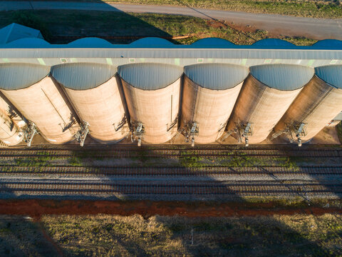 Grain silos on a railway track in the country