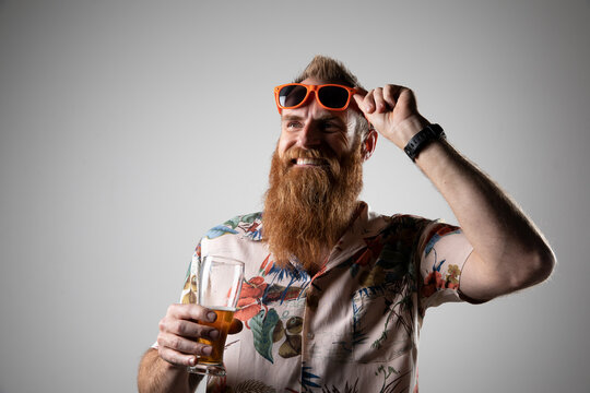 Funky, guy, man holding a glass of beer