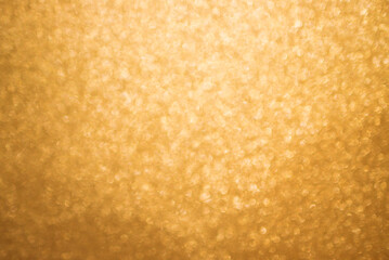 Blurred, unfocused amazing trendy soft gold colour bokeh background 