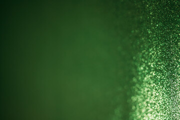 Amazing trendy green colour blurred unfocused bokeh  background with place for text