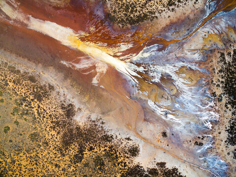 Aerial of water patterns in salt flat