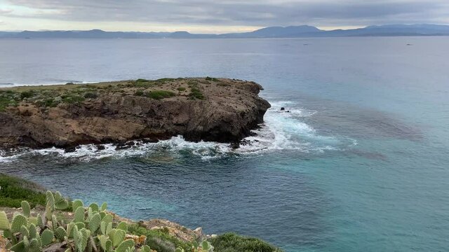 cliff with stormy sea in the crystalline sea of ​​southern Sardinia
