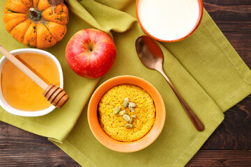 Tasty pumpkin pudding on table